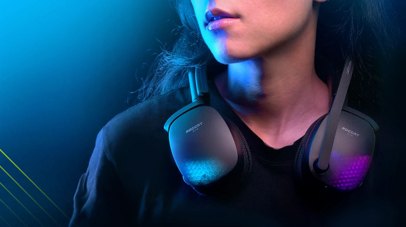 ROCCAT Syn Pro Air gaming headset is around the neck of a woman. 